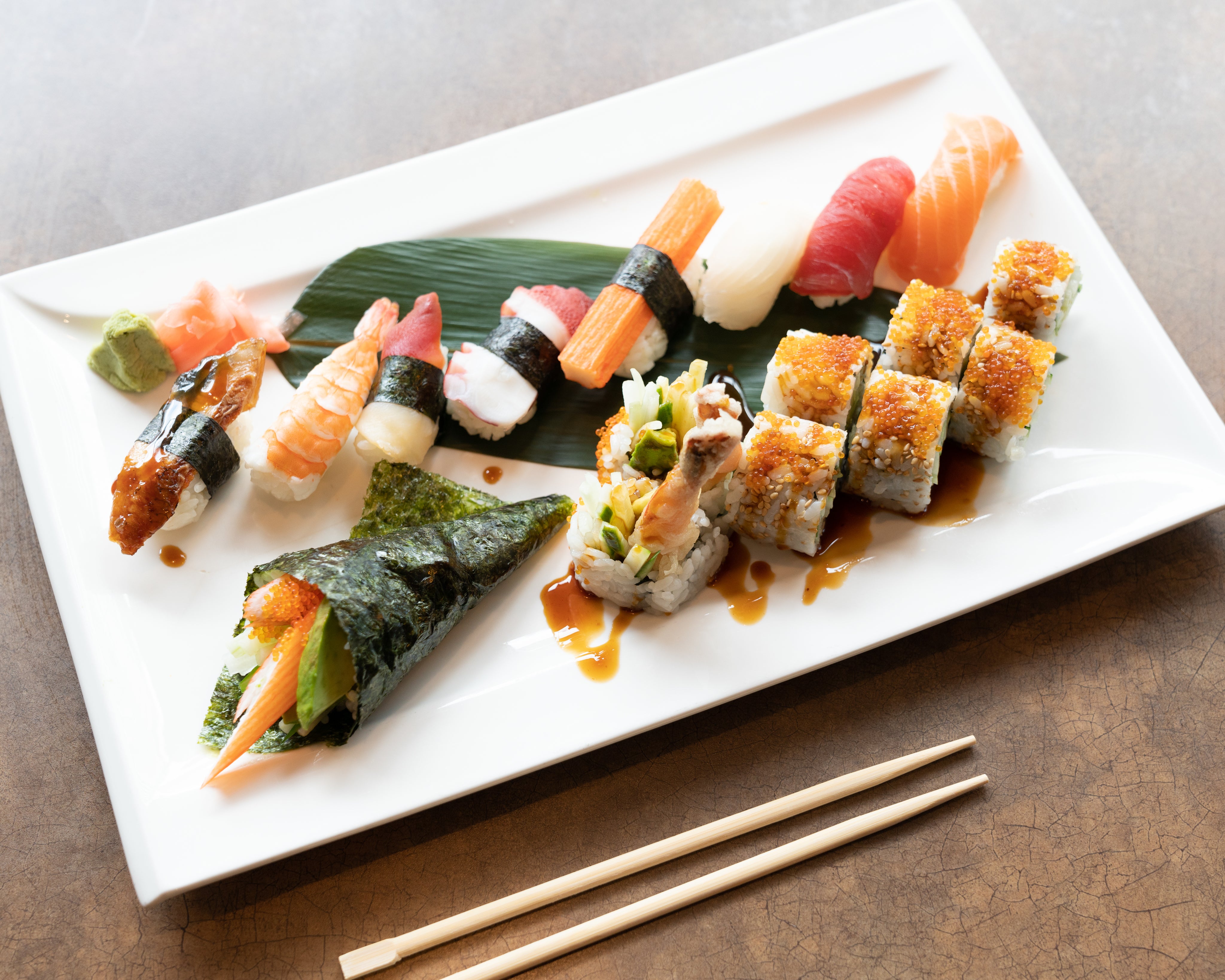 fresh-sushi-rolls-on-white-plate.jpg
